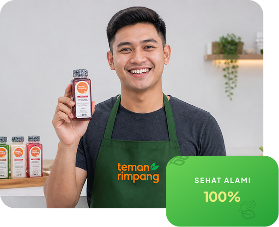 Tim Teman Rimpang memegang produk minuman rempah